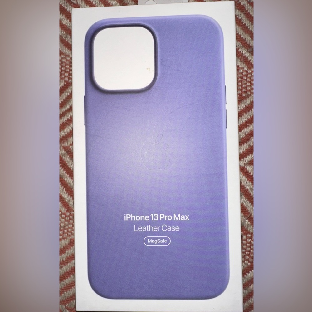 1 Leather Apple iPhone 13 Pro Max cases 1 is light Purple and 1 Black leather.